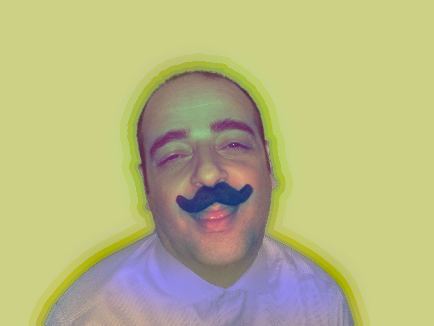 Mike with fake mustache on yellow background